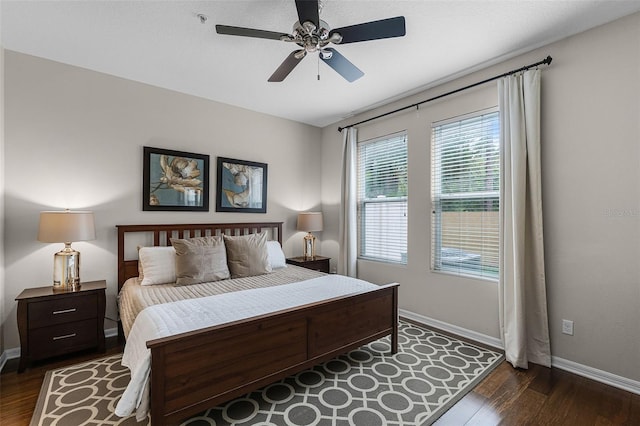 14430 Desert Haven St Unit 4302, Windermere, FL 34786 - bedroom with dark wood-type flooring, baseboards, and ceiling fan