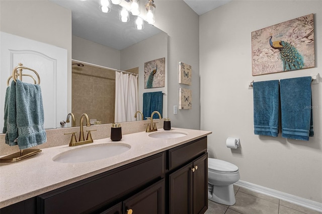 14430 Desert Haven St Unit 4302, Windermere, FL 34786 - full bath with tile patterned flooring, toilet, double vanity, baseboards, and a shower with shower curtain