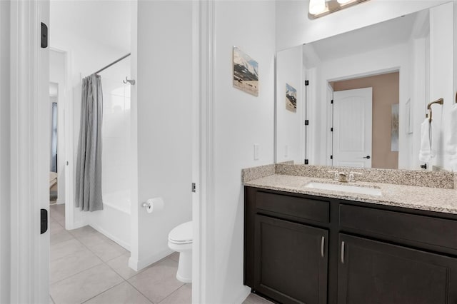 14513 Winter Stay Dr, Winter Garden, FL 34787 - bathroom with tile patterned floors, toilet, vanity, and shower / bathtub combination with curtain