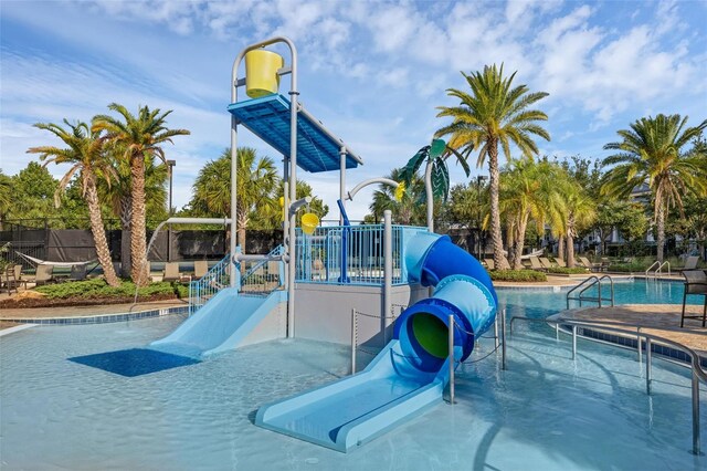 14513 Winter Stay Dr, Winter Garden, FL 34787 - community playground with a community pool and a water play area