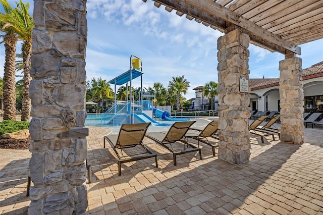 14513 Winter Stay Dr, Winter Garden, FL 34787 - view of patio featuring a swimming pool and a pergola