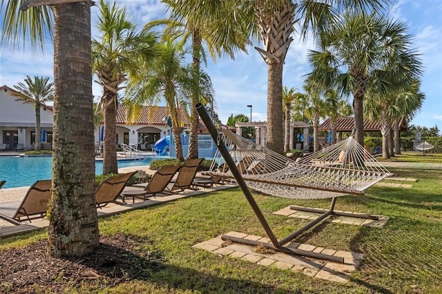 14513 Winter Stay Dr, Winter Garden, FL 34787 - view of play area featuring a yard, a community pool, and a patio area