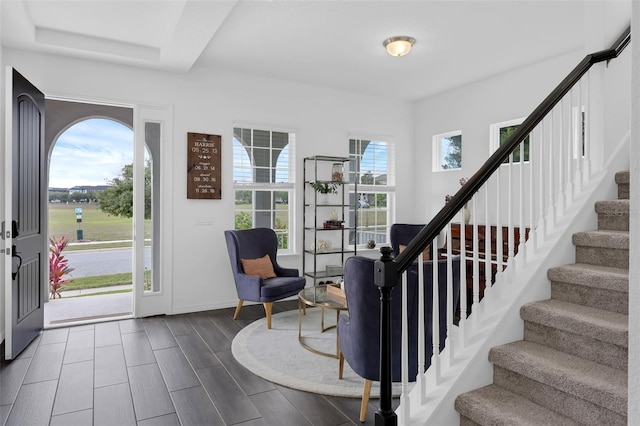 14513 Winter Stay Dr, Winter Garden, FL 34787 - foyer with stairway, wood finish floors, and baseboards