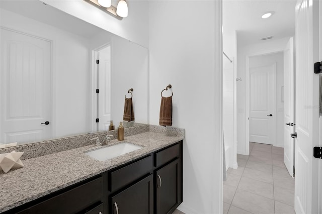 14513 Winter Stay Dr, Winter Garden, FL 34787 - full bath with vanity, tile patterned floors, and bathing tub / shower combination
