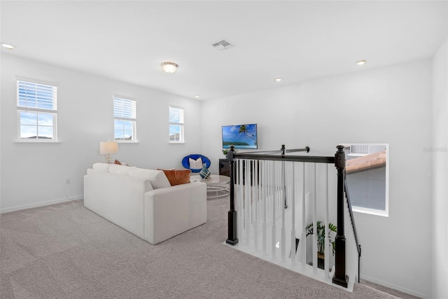 14513 Winter Stay Dr, Winter Garden, FL 34787 - living room featuring carpet, baseboards, and recessed lighting