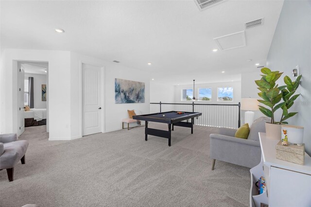 14513 Winter Stay Dr, Winter Garden, FL 34787 - recreation room with light colored carpet, recessed lighting, and attic access