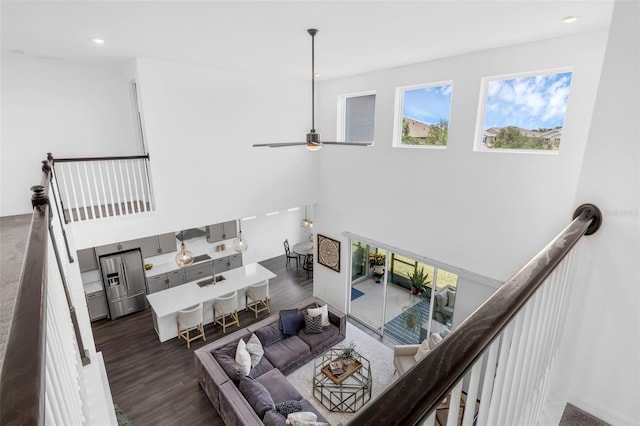 14513 Winter Stay Dr, Winter Garden, FL 34787 - living room with healthy amount of natural light, dark wood finished floors, and recessed lighting