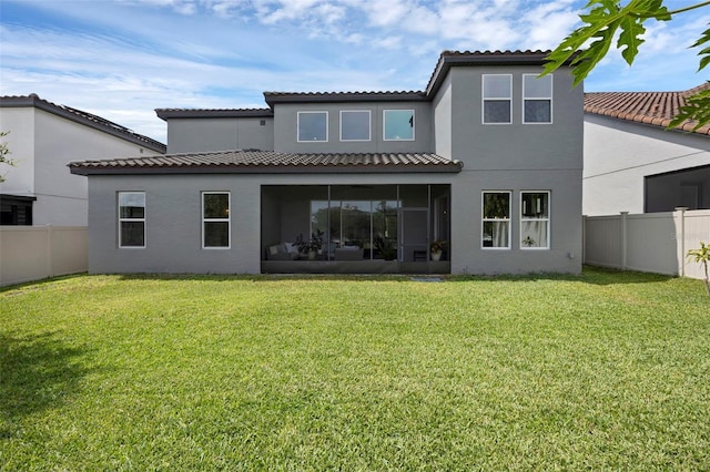 14513 Winter Stay Dr, Winter Garden, FL 34787 - rear view of property featuring a sunroom, stucco siding, and a tile roof