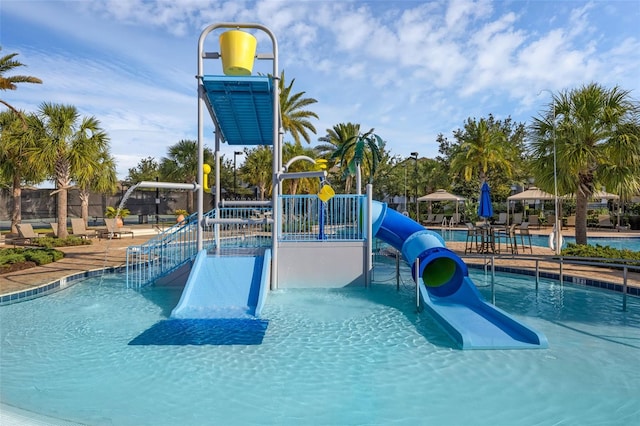 14513 Winter Stay Dr, Winter Garden, FL 34787 - community pool featuring a water play area and a water slide
