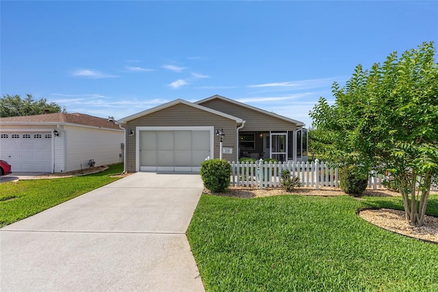 ranch-style home featuring driveway and a garage
