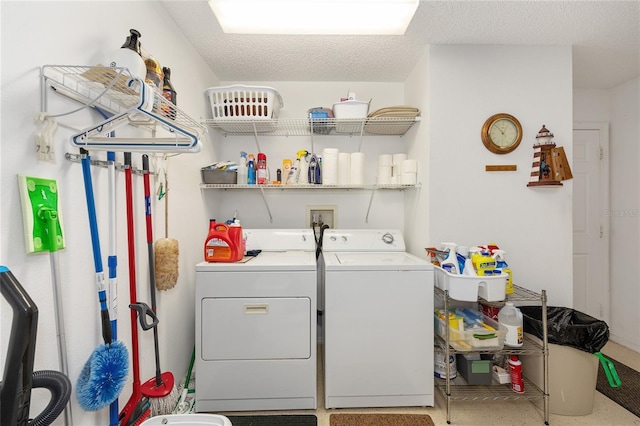 washroom featuring washing machine and dryer