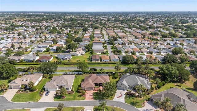 aerial view of property's location featuring nearby suburban area
