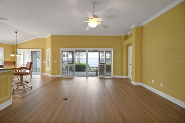 1828 Hollow Branch Way, The Villages, FL 32162 - living area featuring ceiling fan, wood finished floors, baseboards, a chandelier, and crown molding