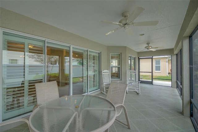 1828 Hollow Branch Way, The Villages, FL 32162 - sunroom / solarium with a ceiling fan, french doors, and outdoor dining area