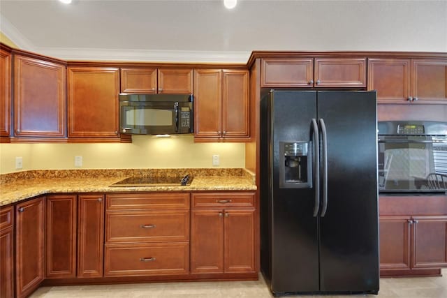 1828 Hollow Branch Way, The Villages, FL 32162 - kitchen featuring black appliances and light stone countertops