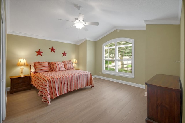 1828 Hollow Branch Way, The Villages, FL 32162 - bedroom with light wood-style floors, vaulted ceiling, baseboards, crown molding, and a ceiling fan