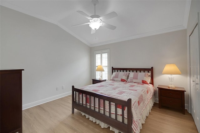 1828 Hollow Branch Way, The Villages, FL 32162 - bedroom featuring light wood-type flooring, vaulted ceiling, baseboards, crown molding, and a ceiling fan