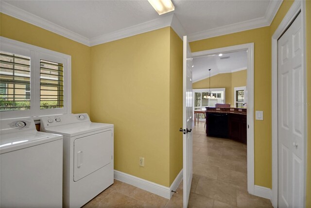 1828 Hollow Branch Way, The Villages, FL 32162 - laundry room featuring independent washer and dryer, plenty of natural light, baseboards, crown molding, and light tile patterned floors