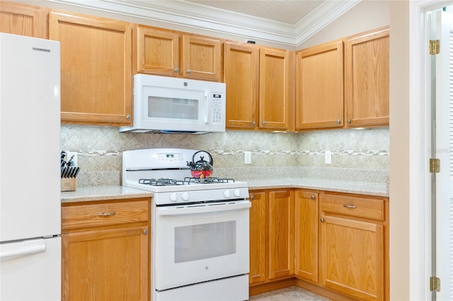 616 Hartford Ln, The Villages, FL 32162 - kitchen featuring white appliances, ornamental molding, and backsplash