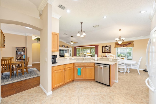 616 Hartford Ln, The Villages, FL 32162 - kitchen with stainless steel dishwasher, a chandelier, a peninsula, crown molding, and a sink