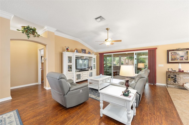 616 Hartford Ln, The Villages, FL 32162 - living area with a ceiling fan, arched walkways, crown molding, wood finished floors, and lofted ceiling