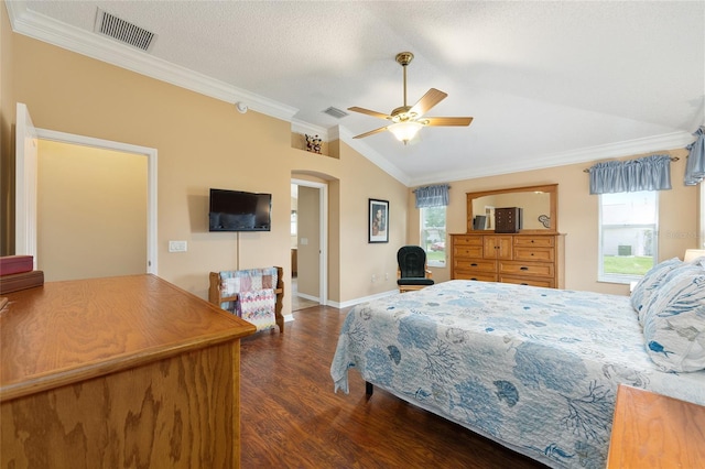 616 Hartford Ln, The Villages, FL 32162 - bedroom with vaulted ceiling, ornamental molding, dark wood finished floors, baseboards, and arched walkways