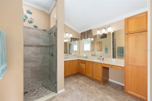 616 Hartford Ln, The Villages, FL 32162 - bathroom featuring ornamental molding, a stall shower, double vanity, baseboards, and lofted ceiling