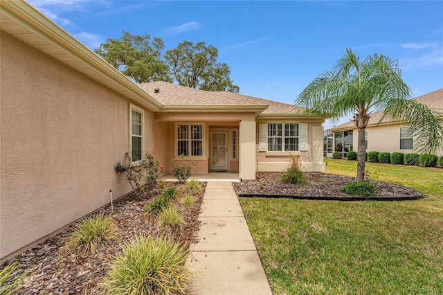 12687 SE 90th Ter, Summerfield, FL 34491 - entrance to property featuring stucco siding and a yard
