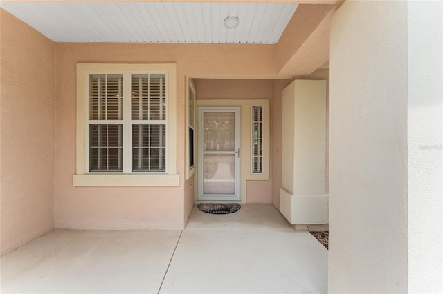 12687 SE 90th Ter, Summerfield, FL 34491 - property entrance featuring stucco siding