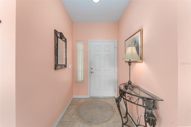 12687 SE 90th Ter, Summerfield, FL 34491 - foyer entrance featuring tile patterned floors and baseboards