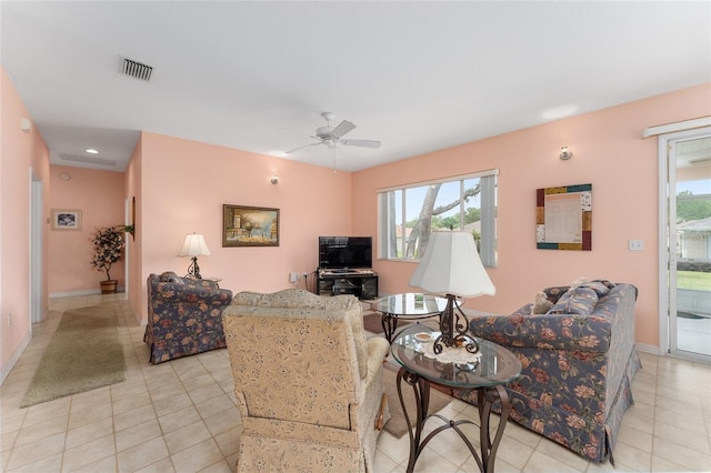 12687 SE 90th Ter, Summerfield, FL 34491 - living area with plenty of natural light, a ceiling fan, light tile patterned floors, and recessed lighting