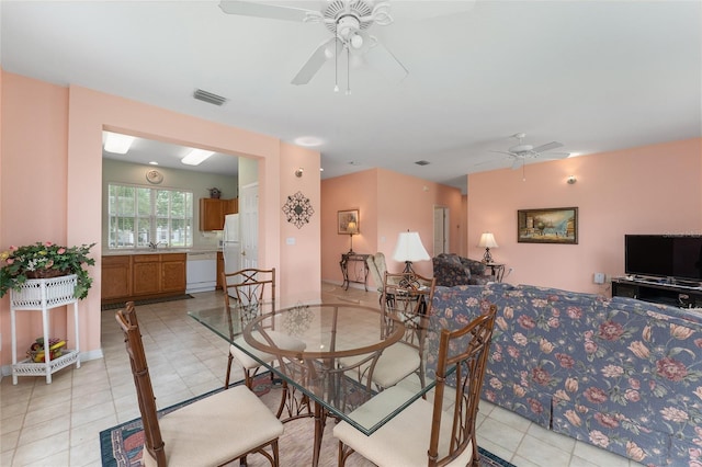 12687 SE 90th Ter, Summerfield, FL 34491 - dining space featuring ceiling fan and light tile patterned floors