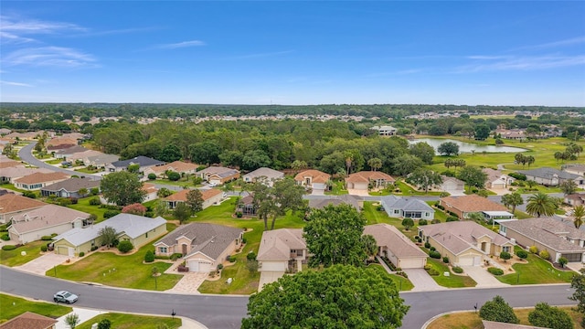 12687 SE 90th Ter, Summerfield, FL 34491 - aerial perspective of suburban area with a nearby body of water