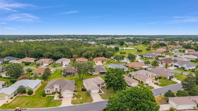 12687 SE 90th Ter, Summerfield, FL 34491 - aerial view of property and surrounding area featuring nearby suburban area and a nearby body of water
