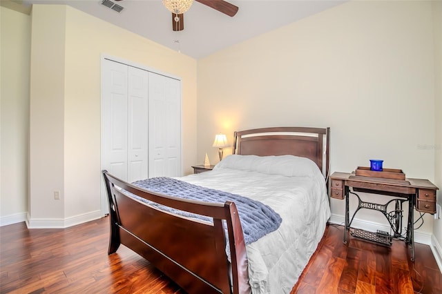 537 Montage Ln, Kissimmee, FL 34759 - bedroom featuring wood finished floors, a closet, baseboards, and a ceiling fan