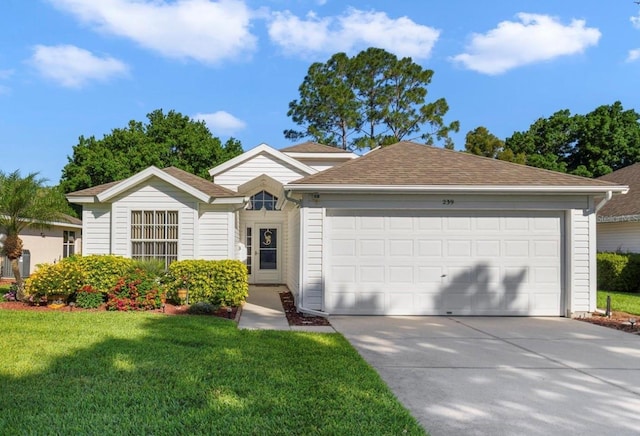 239 Juniper Way, Tavares, FL 32778 - ranch-style house featuring concrete driveway, a garage, a front lawn, and a shingled roof