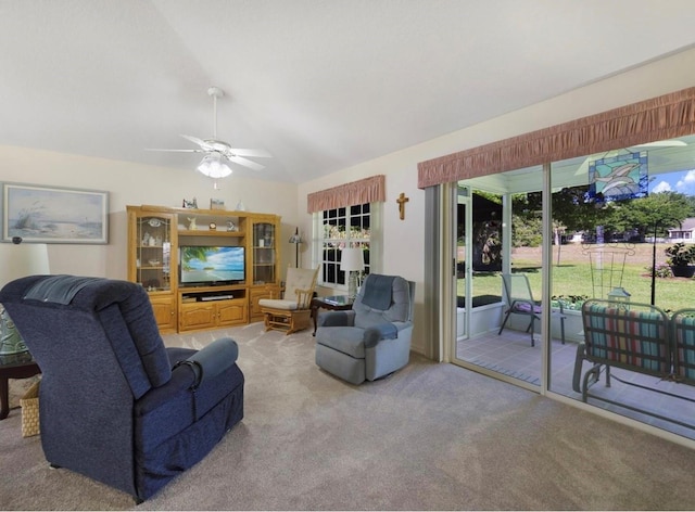 239 Juniper Way, Tavares, FL 32778 - living room featuring carpet floors, a ceiling fan, and lofted ceiling