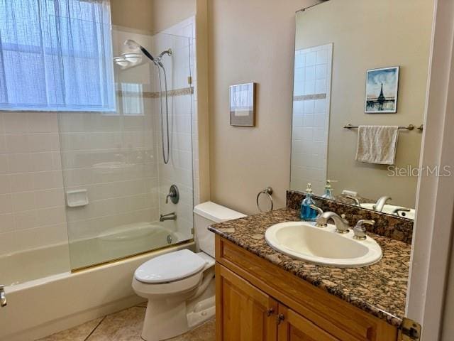 3083 Pinnacle Ct, Clermont, FL 34711 - full bathroom featuring toilet, vanity, tile patterned flooring, and shower / tub combination