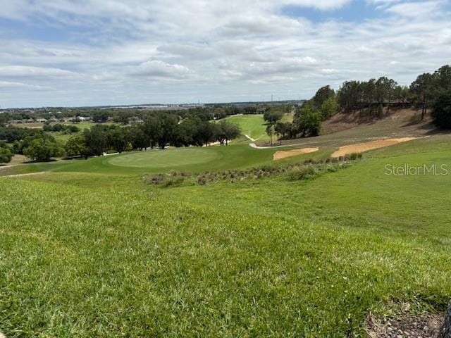 3083 Pinnacle Ct, Clermont, FL 34711 - view of home's community featuring golf course view and a yard