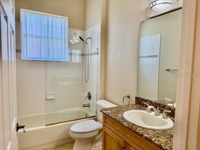 3083 Pinnacle Ct, Clermont, FL 34711 - full bathroom with vanity, enclosed tub / shower combo, and tile patterned flooring