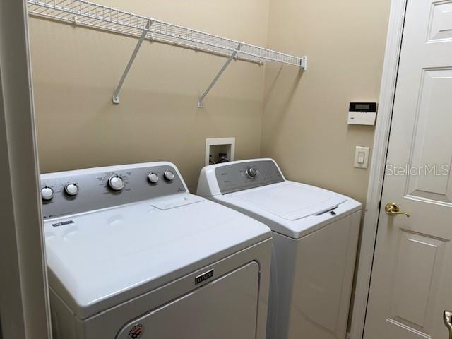3083 Pinnacle Ct, Clermont, FL 34711 - laundry room with washing machine and clothes dryer