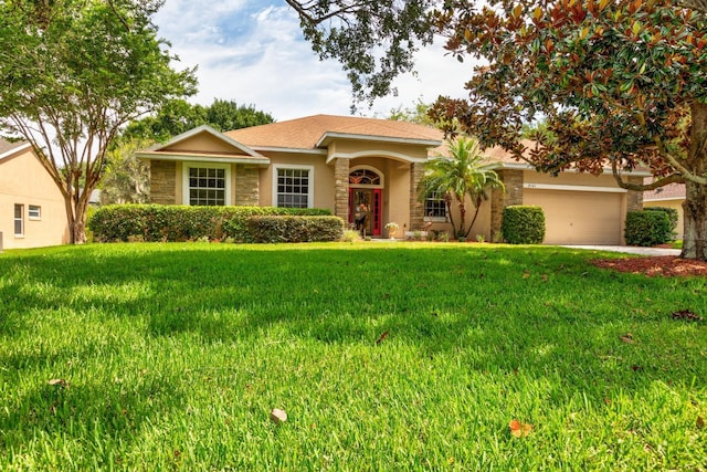 3141 Brighton Rd, Eustis, FL 32726 - ranch-style home featuring stucco siding, a front lawn, stone siding, and an attached garage