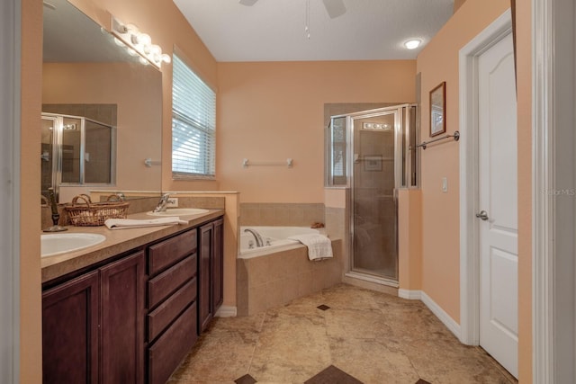 3141 Brighton Rd, Eustis, FL 32726 - full bath with a stall shower, a garden tub, double vanity, and ceiling fan