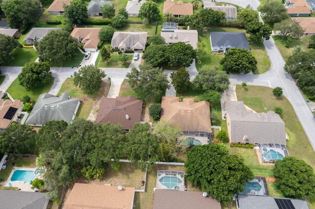 3141 Brighton Rd, Eustis, FL 32726 - aerial view of property and surrounding area featuring nearby suburban area and a pool area