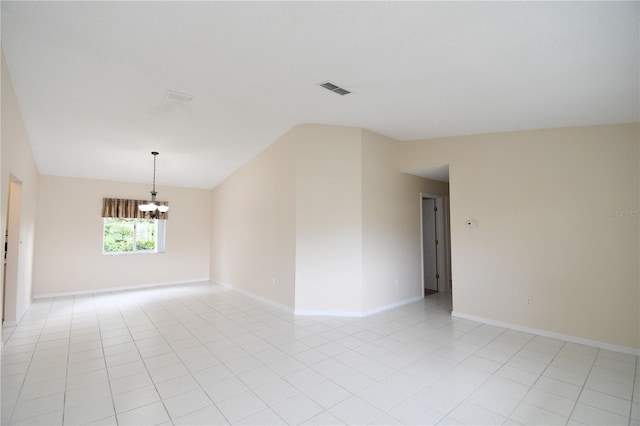 spare room with lofted ceiling, a chandelier, baseboards, and light tile patterned flooring