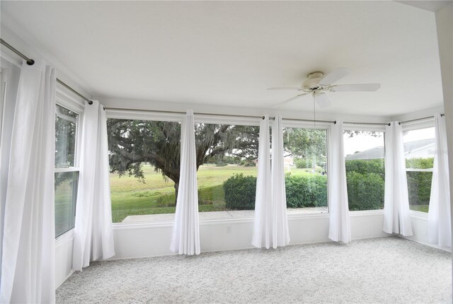 unfurnished sunroom with plenty of natural light