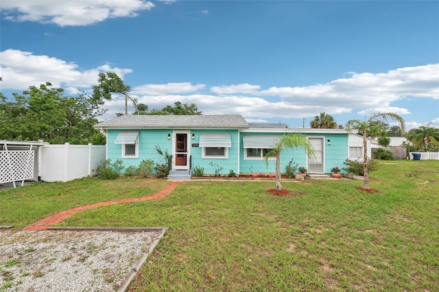 1301 N Ave, Tavares, FL 32778 - ranch-style home featuring entry steps