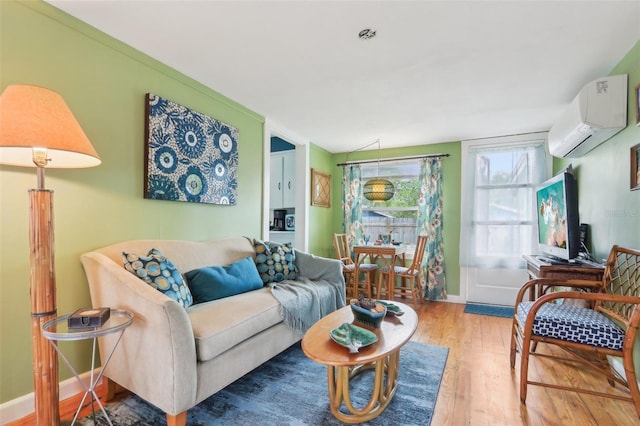 1301 N Ave, Tavares, FL 32778 - living room with an AC wall unit, wood finished floors, and baseboards