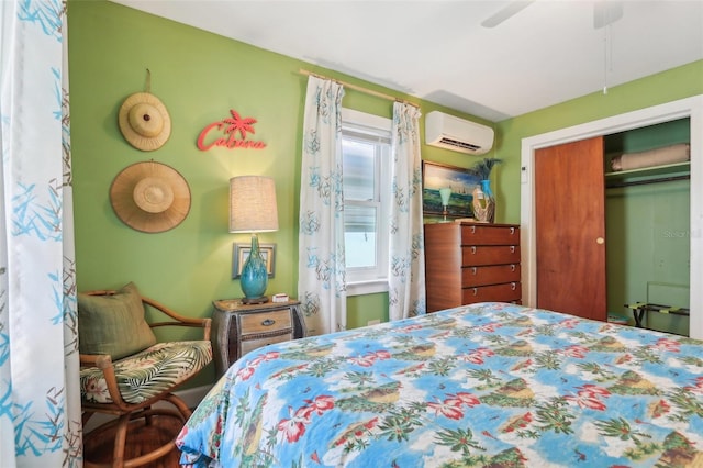 1301 N Ave, Tavares, FL 32778 - bedroom featuring a wall unit AC, ceiling fan, and a closet