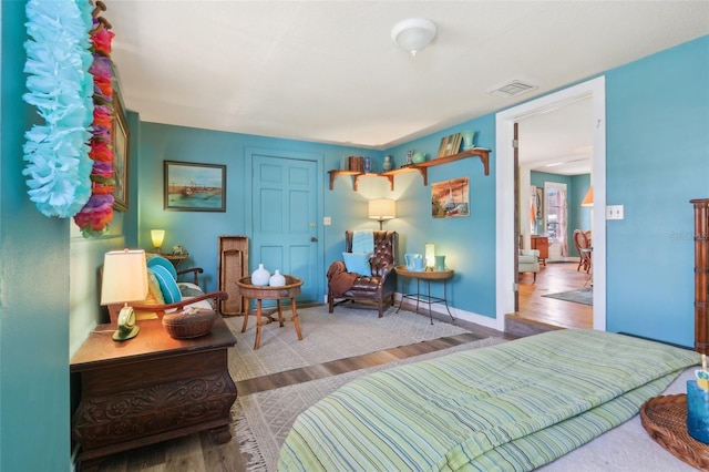 1301 N Ave, Tavares, FL 32778 - bedroom with wood finished floors and baseboards